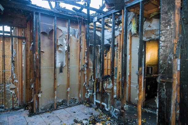 Professional Fire Damage Restoration technician working in Independence, WI